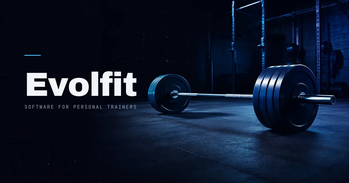 Loaded olympic barbell in a dimly lit gym